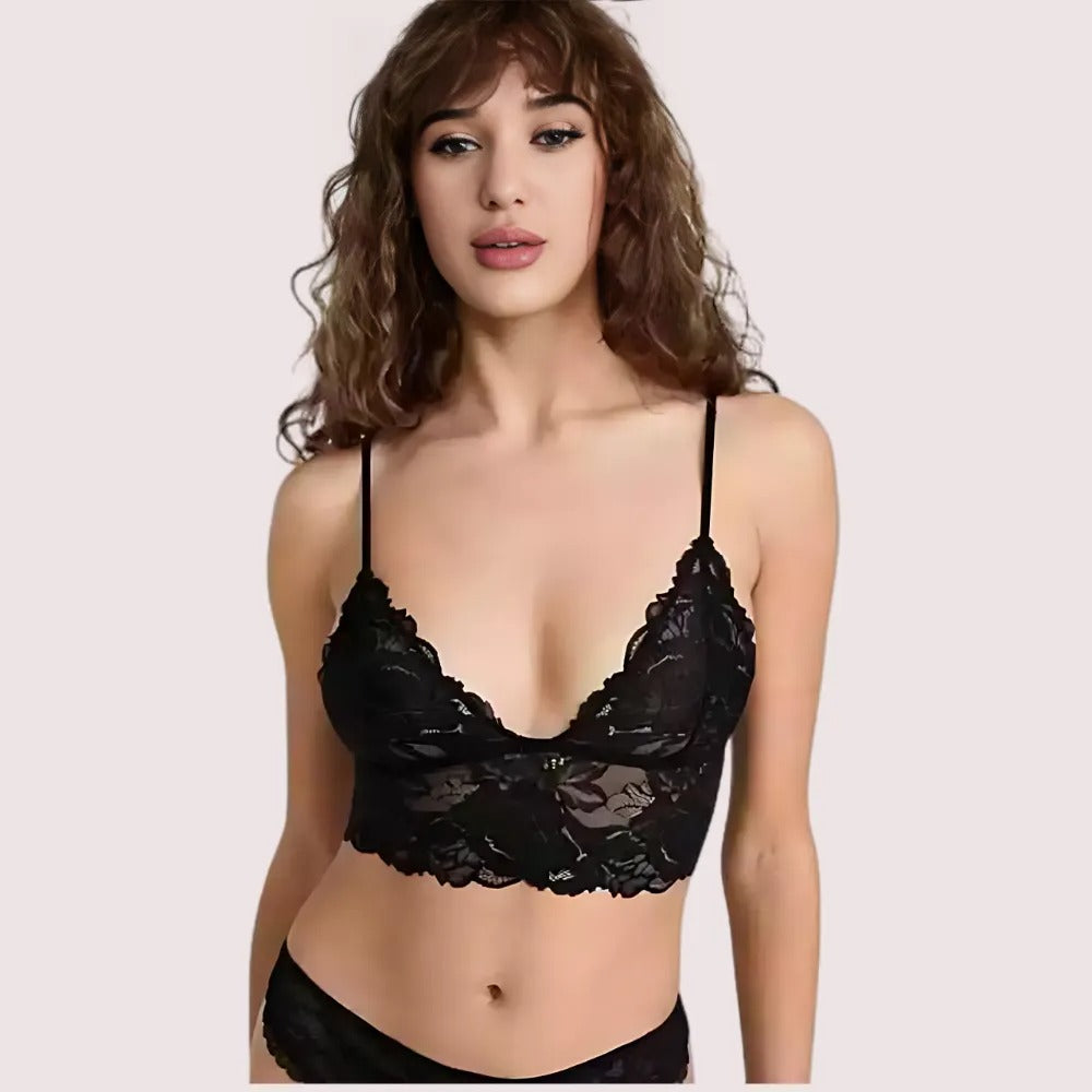 Front view of model wearing the Luxe Whisper Signature Bralette in black lace by KozyKlicks, showing delicate floral lace details and soft support.