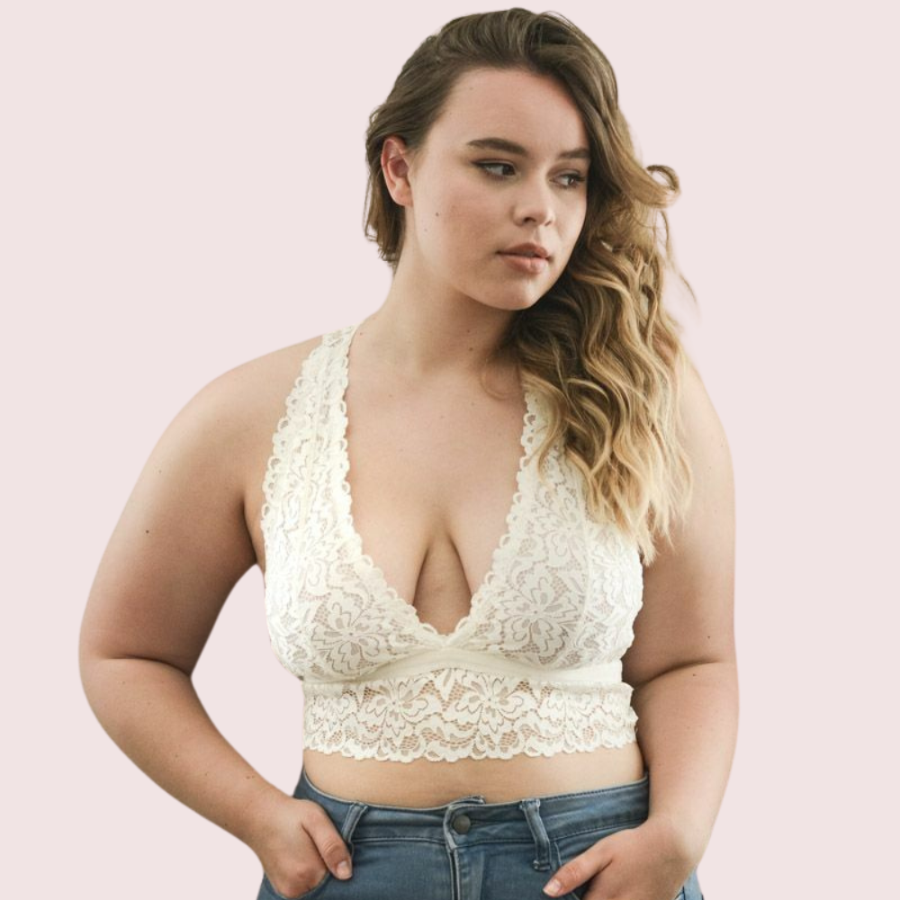 Front view of plus size white lace bralette with deep V neckline, soft and supportive design by KozyKlicks.