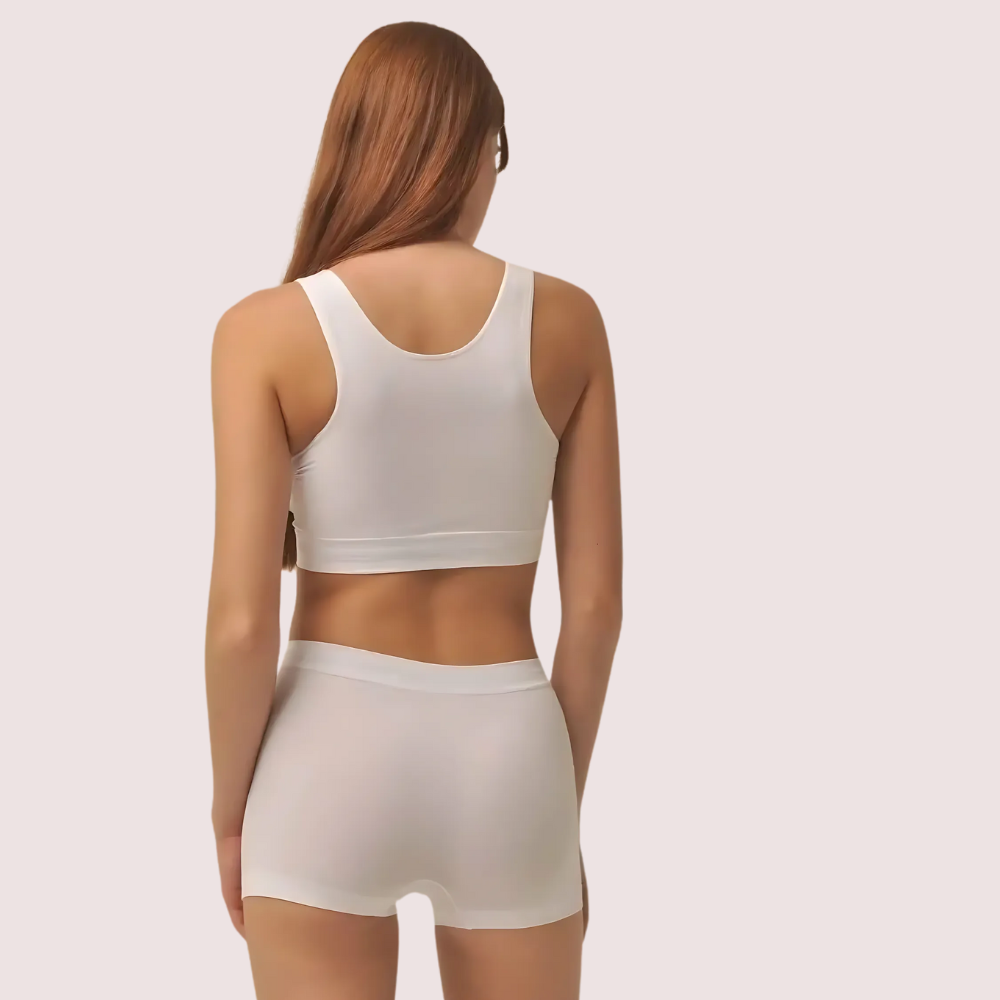 Zen White Performance Set – back view showing seamless racerback sports bra and stretch-fit boyshorts in white. Smooth, breathable, and supportive women’s activewear by KozyKlicks.
