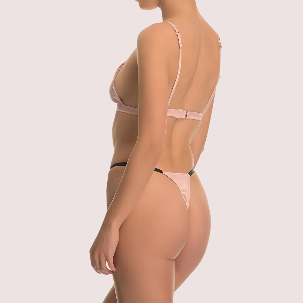 Side view of luxury blush pink silk lingerie set for women with soft triangle bra and thong