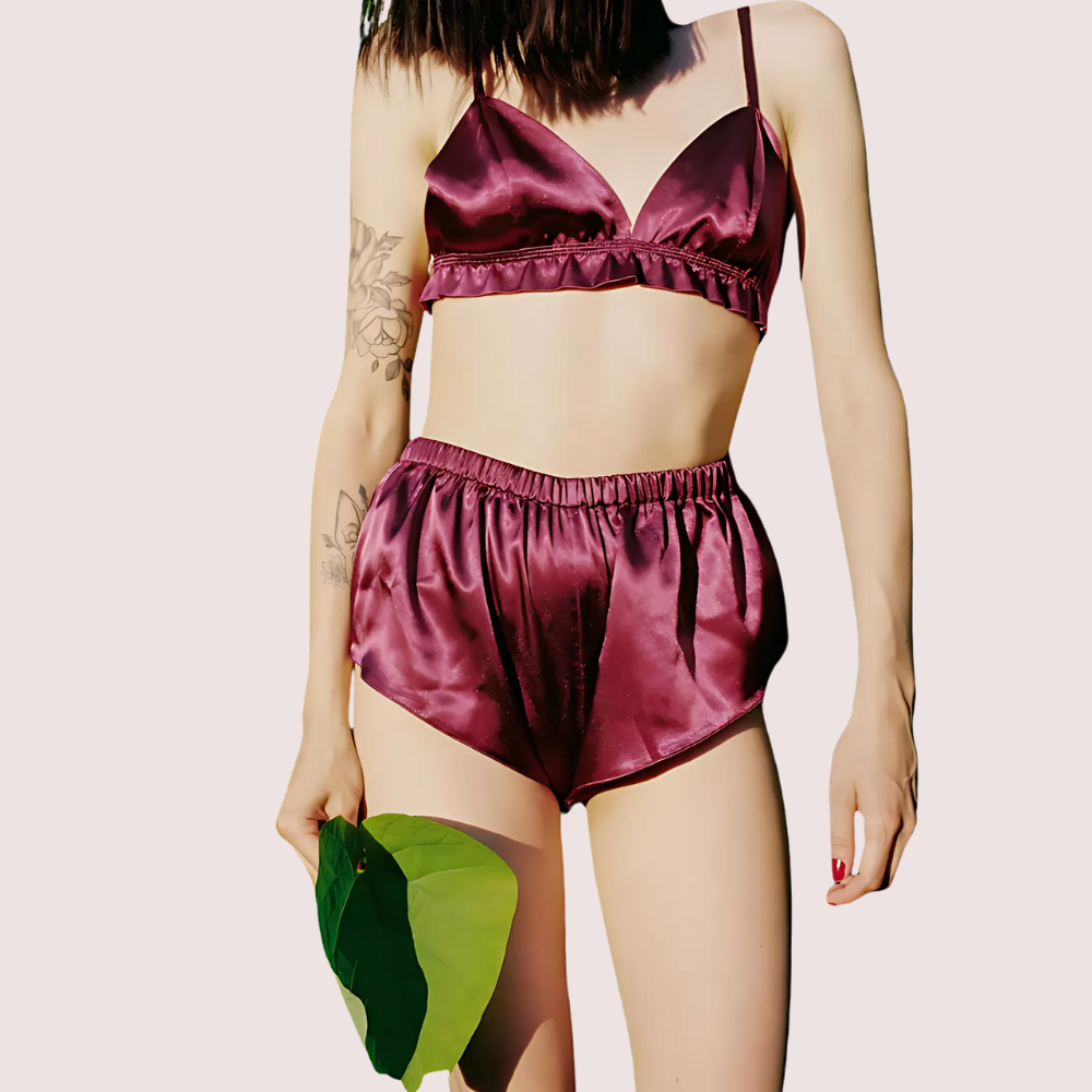 KozyKlicks classic pure silk bra and shorts set for women in deep plum wine color, front view highlighting soft satin shine and relaxed fit.